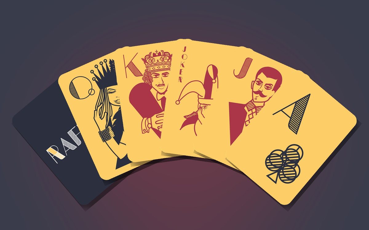 A fan of Rafiki playing cards: the navy Rafiki back, the Queen of Spades, King of Hearts, Joker, Jack of Diamonds and Ace of Clubs